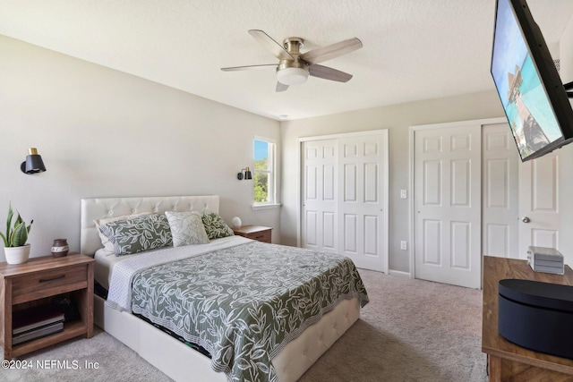 bedroom with ceiling fan and carpet flooring