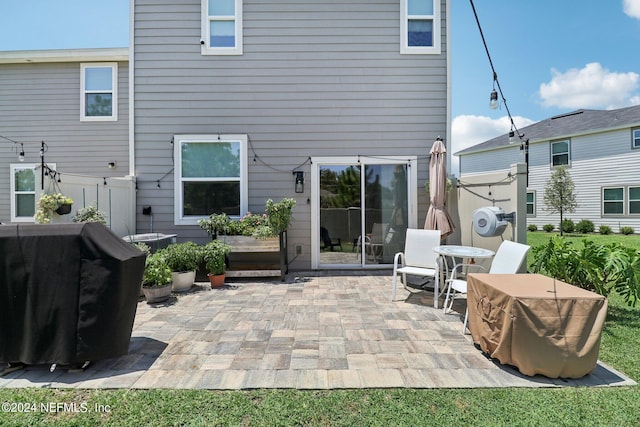 back of house featuring a patio area