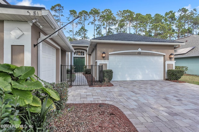 view of front of house with a garage