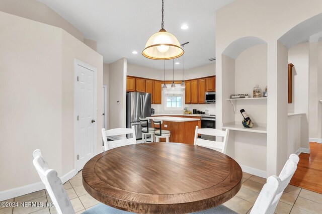 dining room with light wood-type flooring