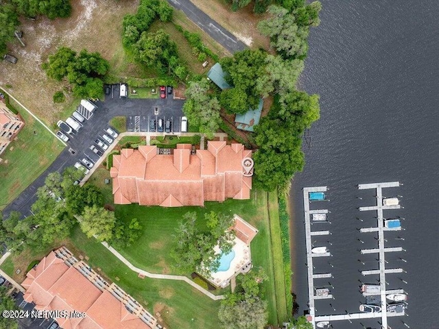 birds eye view of property featuring a water view