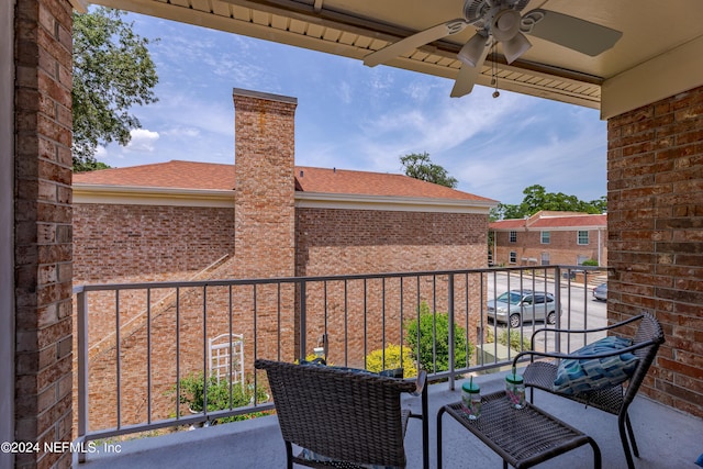 balcony featuring ceiling fan