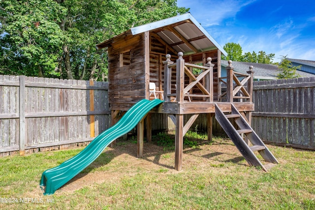 view of jungle gym with a yard