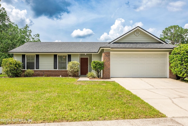 single story home with a garage and a front yard