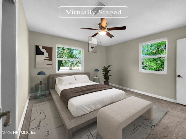 bedroom featuring ceiling fan