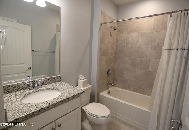 full bathroom featuring vanity, shower / tub combo, and toilet