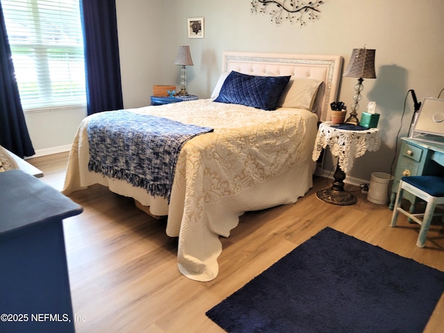 9252 San Jose Blvd Unit 4301, Jacksonville, FL 32257 - bedroom featuring wood finished floors and baseboards