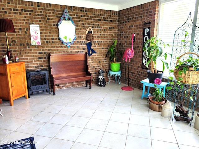 9252 San Jose Blvd Unit 4301, Jacksonville, FL 32257 - exterior space with brick wall, a wood stove, and light tile patterned flooring