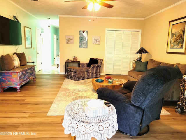 9252 San Jose Blvd Unit 4301, Jacksonville, FL 32257 - living room with wood finished floors, a ceiling fan, baseboards, and ornamental molding