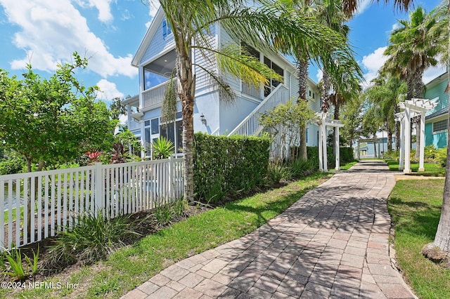 view of home's exterior with a fenced front yard