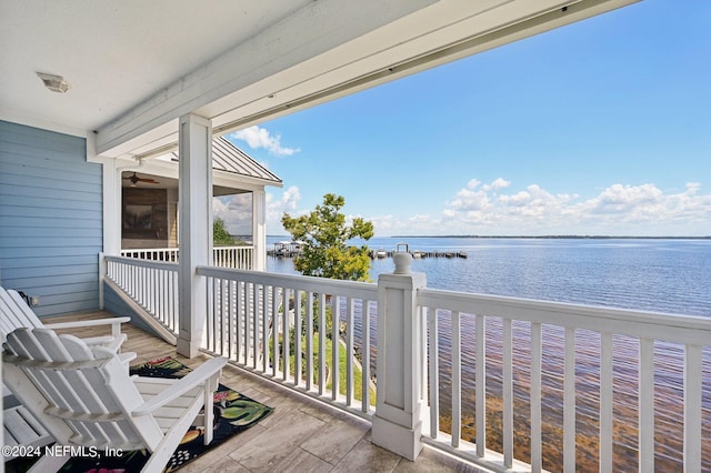 balcony featuring a water view