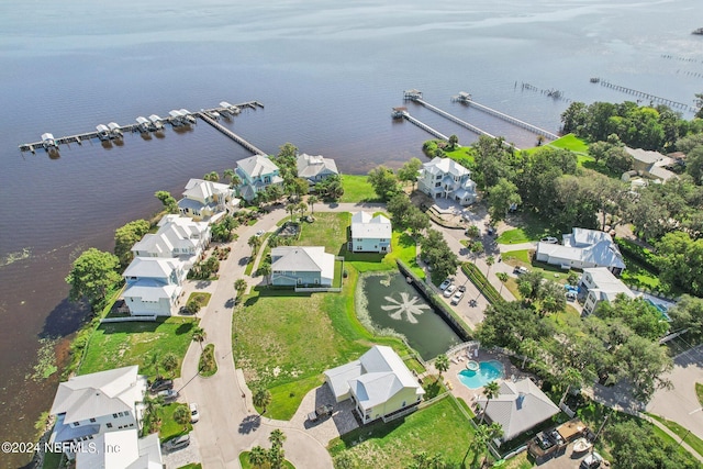 aerial view with a water view and a residential view