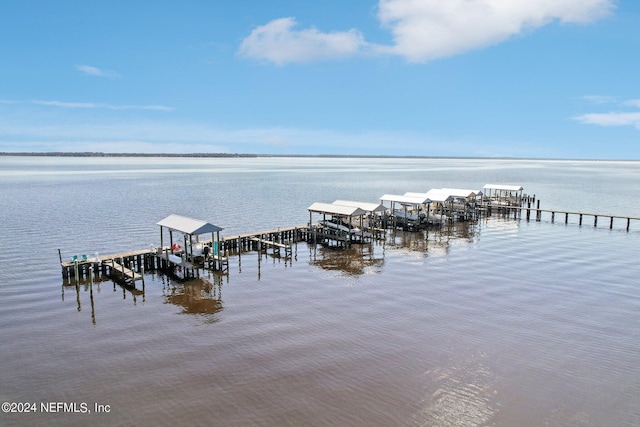 view of dock featuring a water view and boat lift