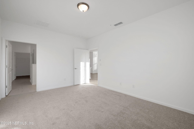 unfurnished bedroom with light carpet