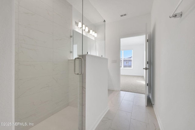 bathroom featuring an enclosed shower