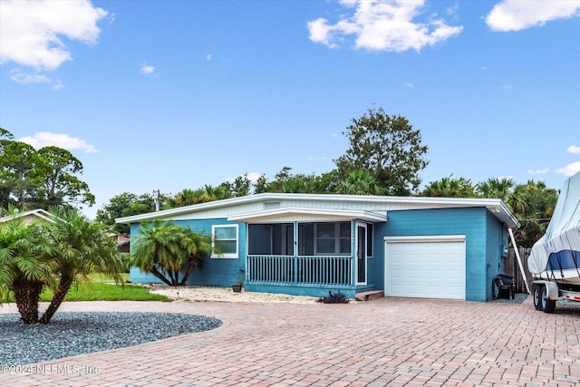 single story home with a garage