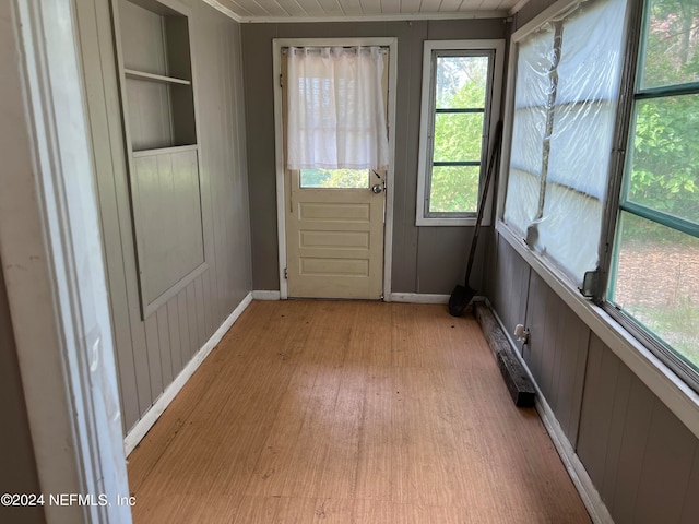 doorway to outside with light hardwood / wood-style floors