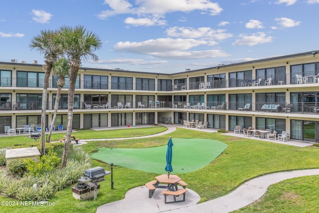 view of community with a patio