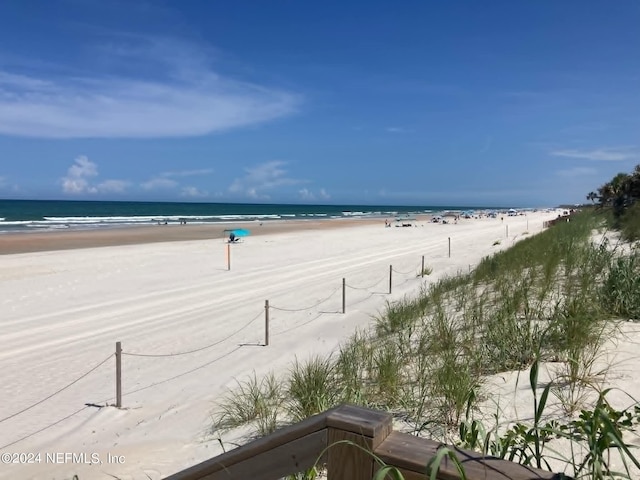 water view featuring a beach view