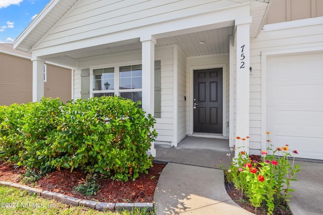 entrance to property with a garage