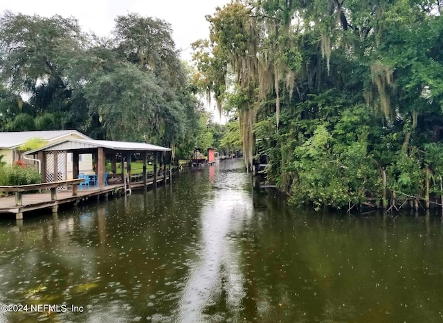 view of dock with a water view