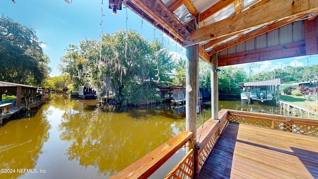 dock area featuring a water view