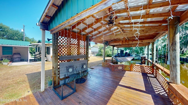 wooden deck with ceiling fan