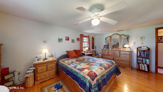 bedroom featuring ceiling fan and light hardwood / wood-style flooring