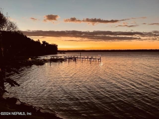 view of dock with a water view