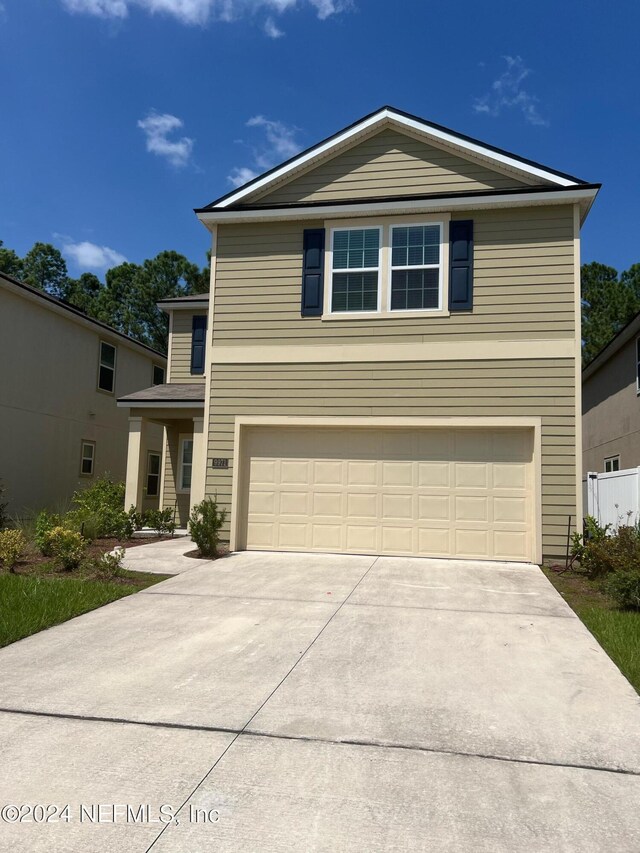 front facade with a garage