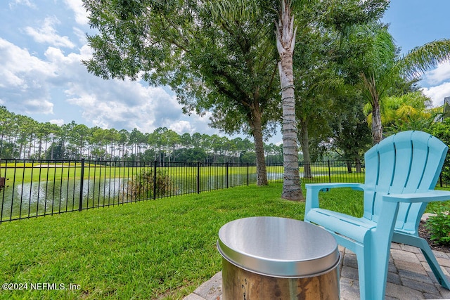 view of yard with a water view