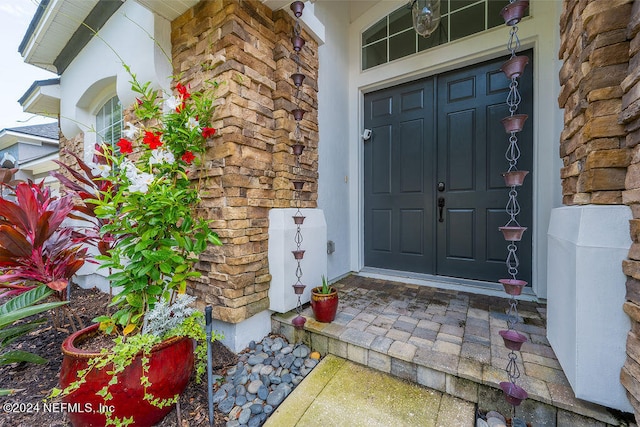 doorway to property featuring a porch