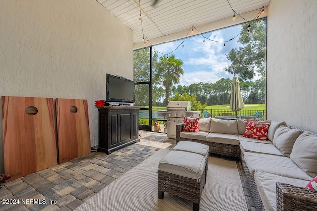 sunroom featuring wood ceiling