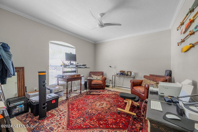 office space with ceiling fan, crown molding, and a textured ceiling