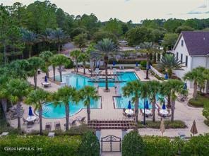 view of pool featuring a patio area