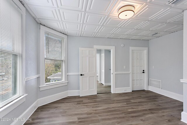 empty room featuring hardwood / wood-style flooring