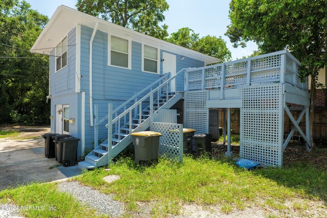 exterior space featuring a wooden deck