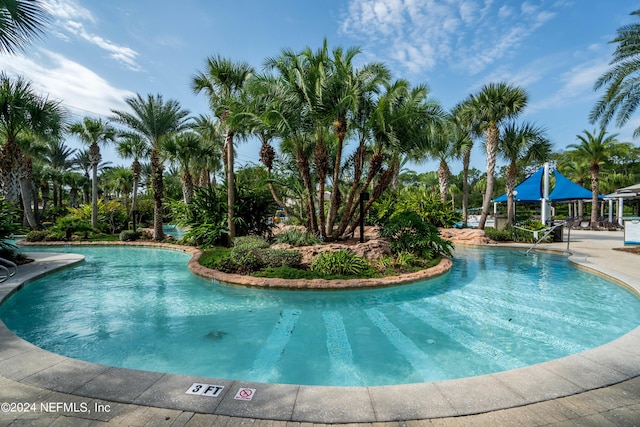 community pool featuring a gazebo