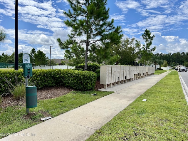 view of property's community with mail boxes