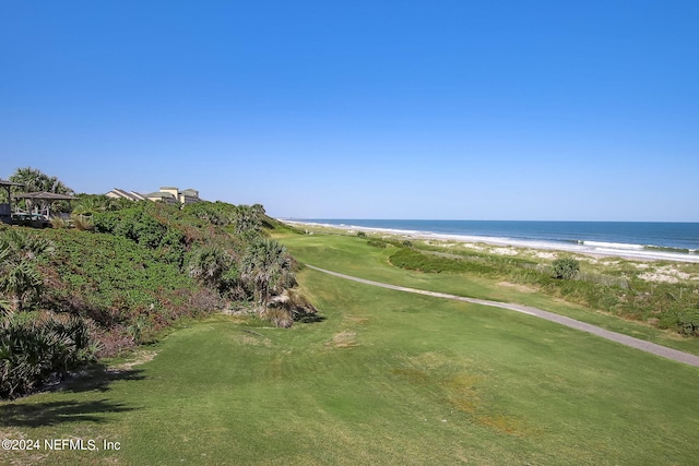 aerial view featuring a water view and a view of the beach