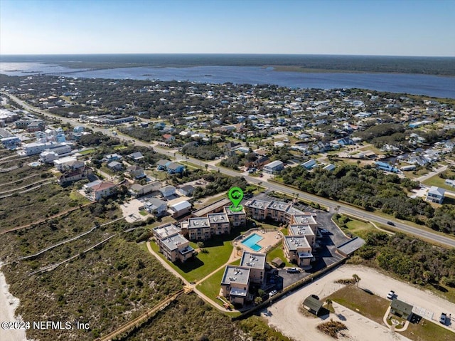 bird's eye view with a water view