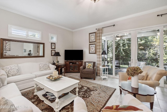 living room featuring ornamental molding, french doors, a wealth of natural light, and light tile patterned floors