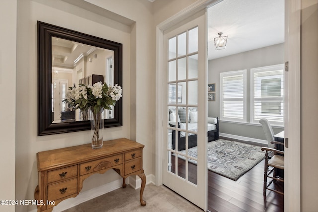 doorway with light hardwood / wood-style floors