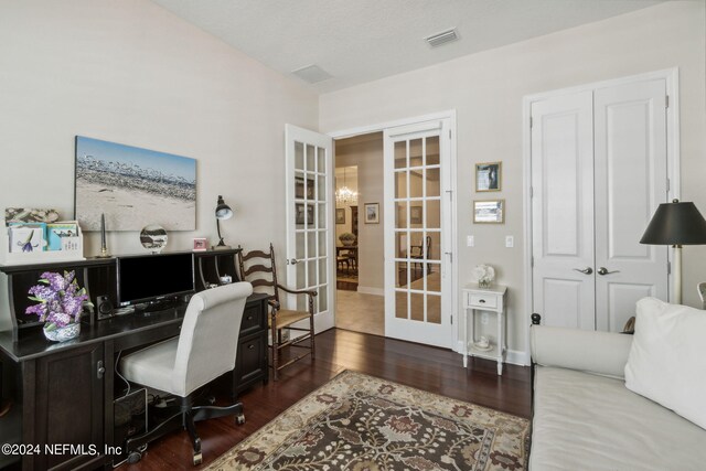 office space featuring french doors and dark wood-type flooring