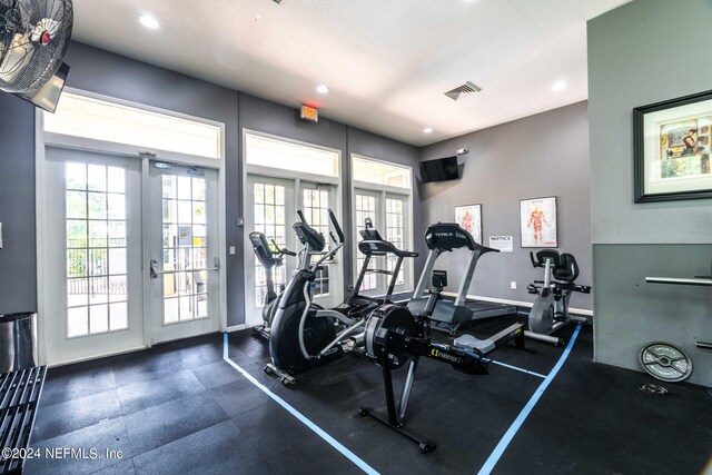 gym featuring french doors