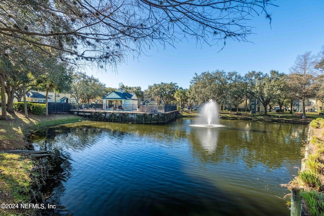 property view of water with a gazebo