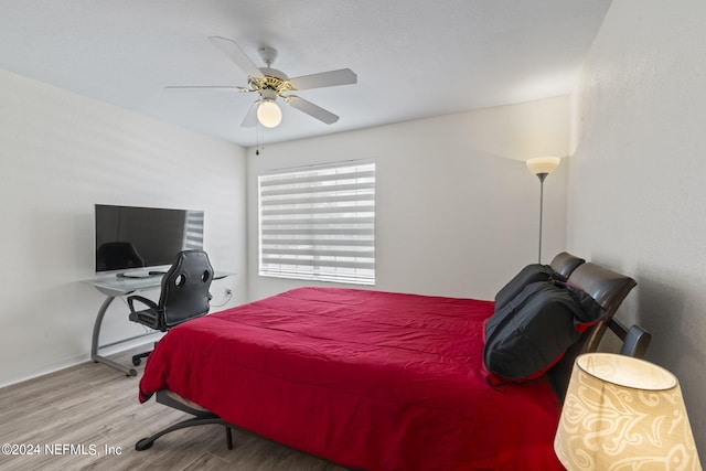 bedroom featuring ceiling fan and light wood-type flooring