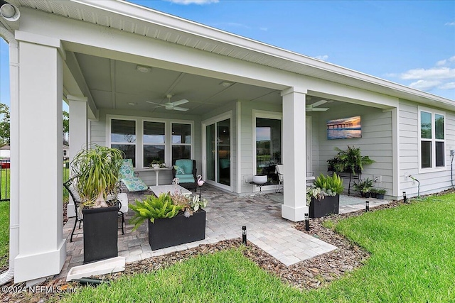 view of patio featuring a ceiling fan