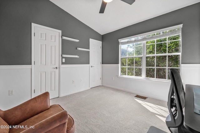 sitting room with light carpet, lofted ceiling, and ceiling fan