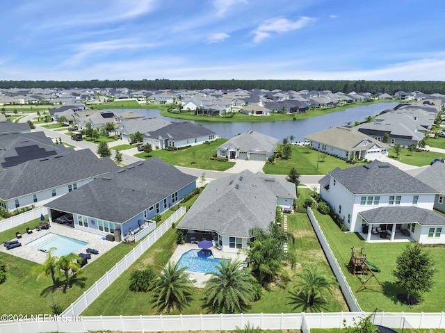 birds eye view of property featuring a water view